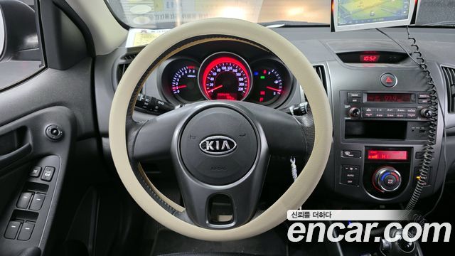 Kia Porte 2011 — photo 13
