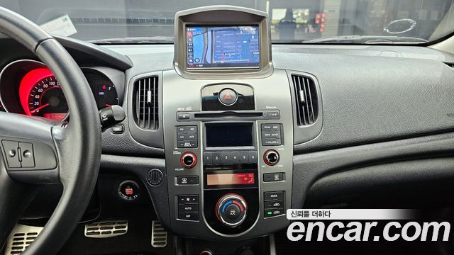 Kia Porte 2010 — photo 16
