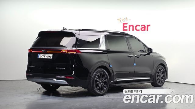 Kia Canival 2021 — photo 2