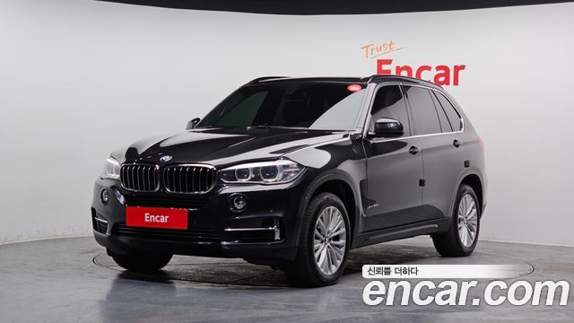 BMW X5 2014 — photo 1