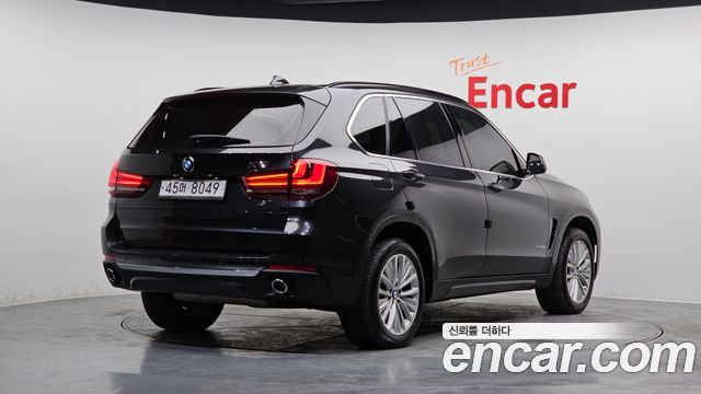 BMW X5 2014 — photo 2