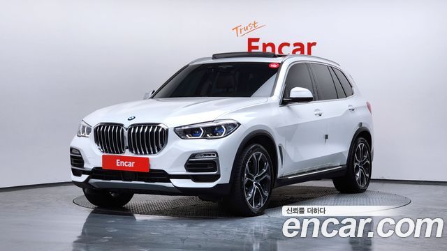 BMW X5 2021 — photo 1