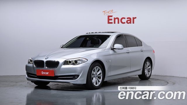 BMW 5-Series 2010 — photo 1