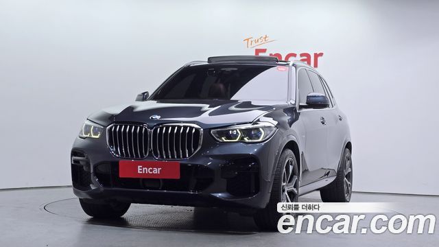 BMW X5 2022 — photo 1