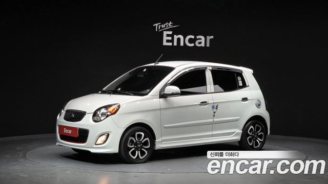Kia morning 2011 — photo 1