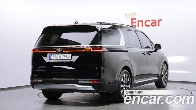 Kia Canival 2021 — photo 2