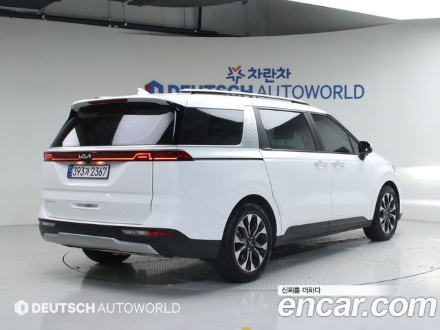 Kia Canival 2023 — photo 2