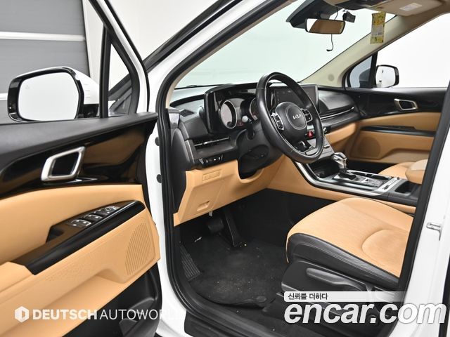 Kia Canival 2023 — photo 11