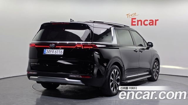 Kia Canival 2021 — photo 2