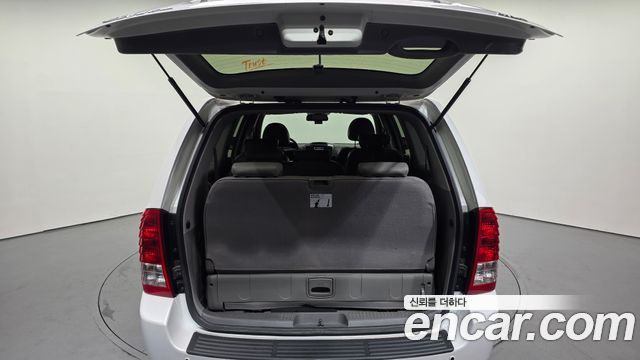 Kia Canival 2014 — photo 20