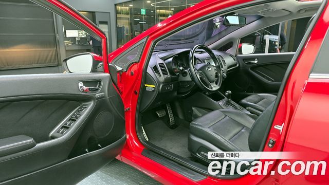 Kia K3 2013 — photo 11