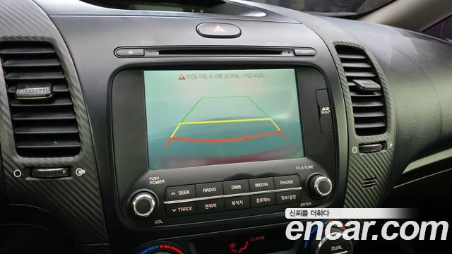 Kia K3 2013 — photo 16