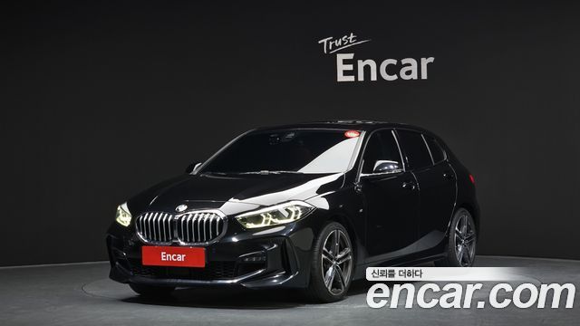 BMW 1-Series 2022 — photo 1