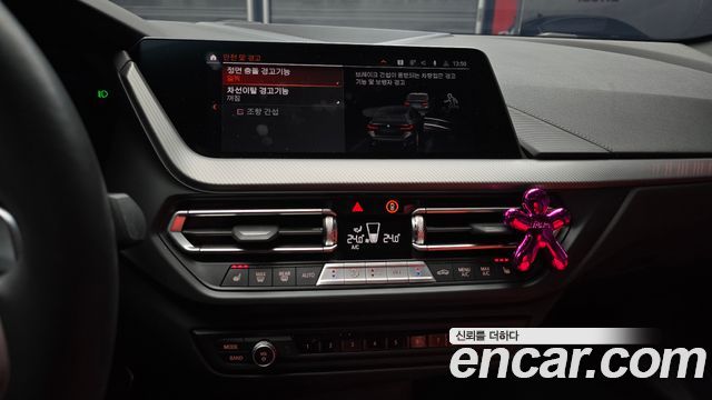 BMW 1-Series 2022 — photo 16