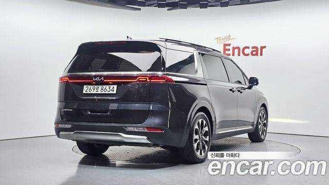 Kia Canival 2023 — photo 2