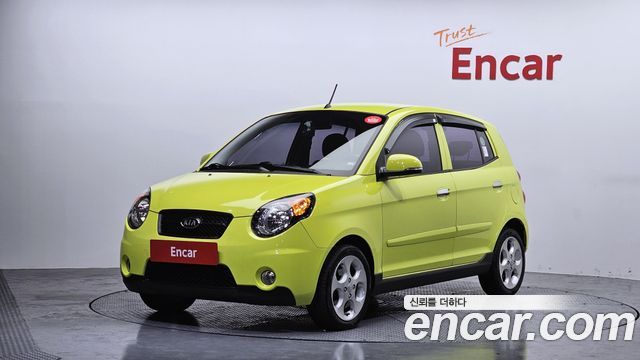 Kia morning 2010 — photo 1
