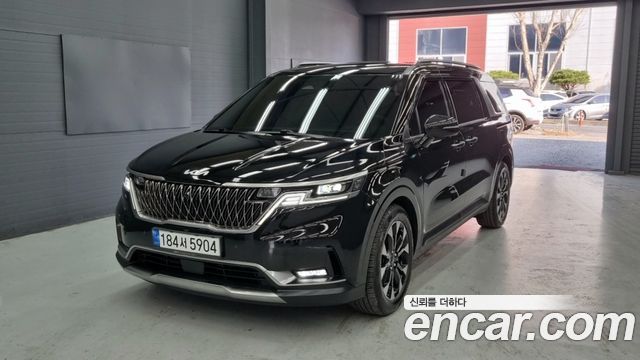 Kia Canival 2023 — photo 1