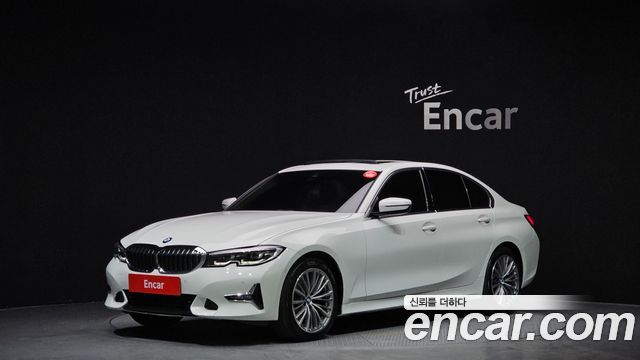 BMW 3-Series 2021 — photo 1