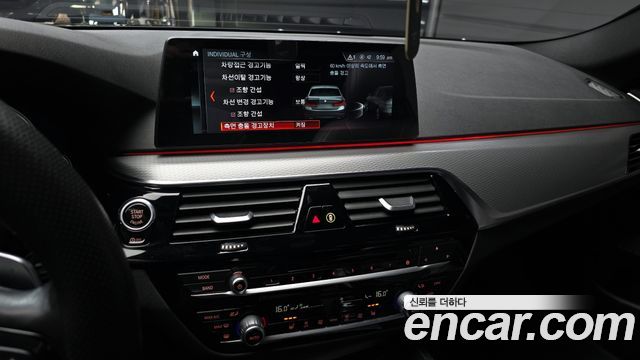 BMW 5-Series 2018 — photo 16