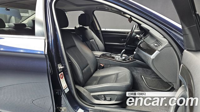 BMW 5-Series 2011 — photo 10