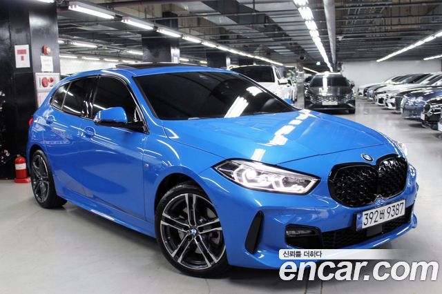 BMW 1-Series 2023 — photo 1