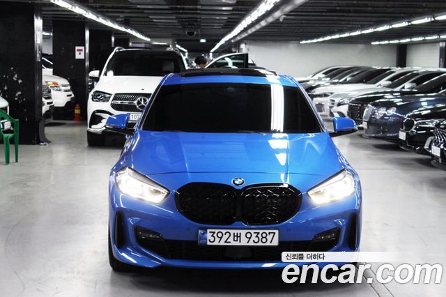 BMW 1-Series 2023 — photo 2