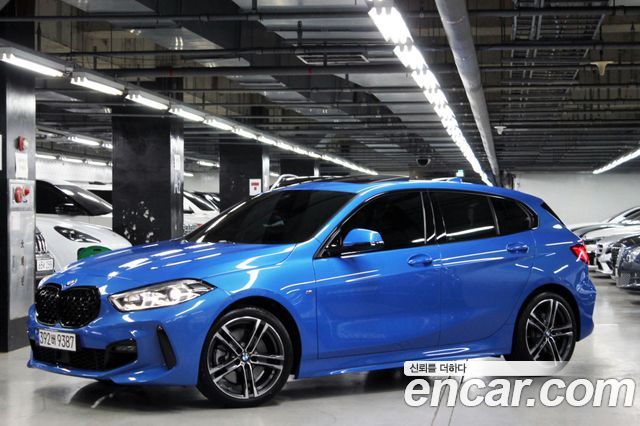 BMW 1-Series 2023 — photo 3