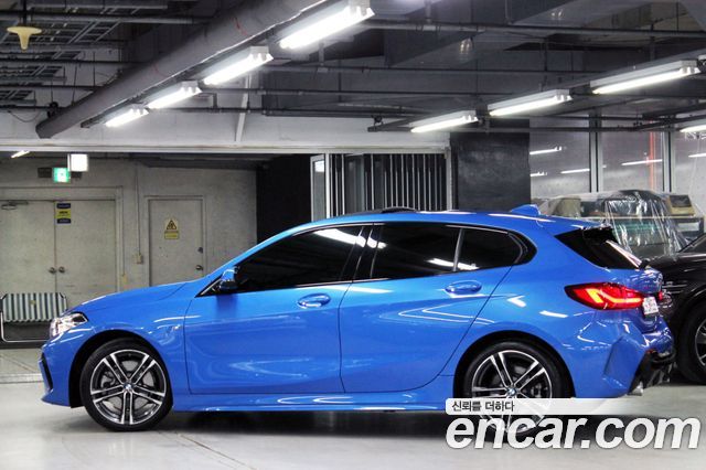 BMW 1-Series 2023 — photo 4