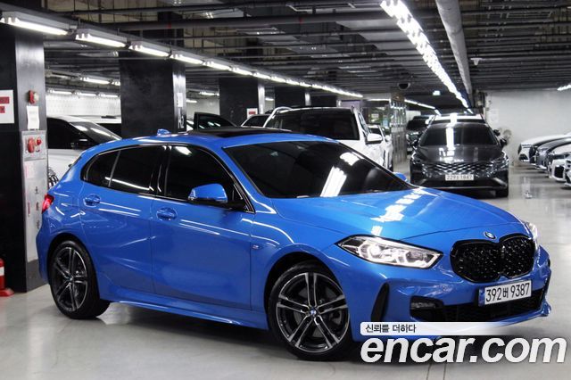 BMW 1-Series 2023 — photo 17