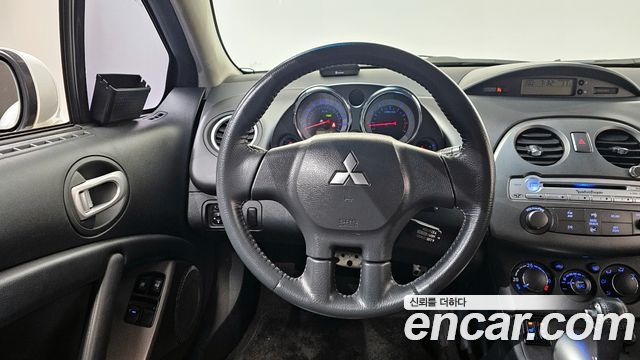 Mitsubishi Eclipse 2009 — photo 12