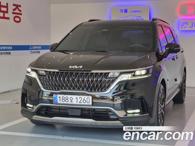 Kia Canival 2023 — photo 1