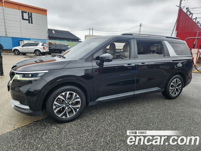 Kia Canival 2021 — photo 2