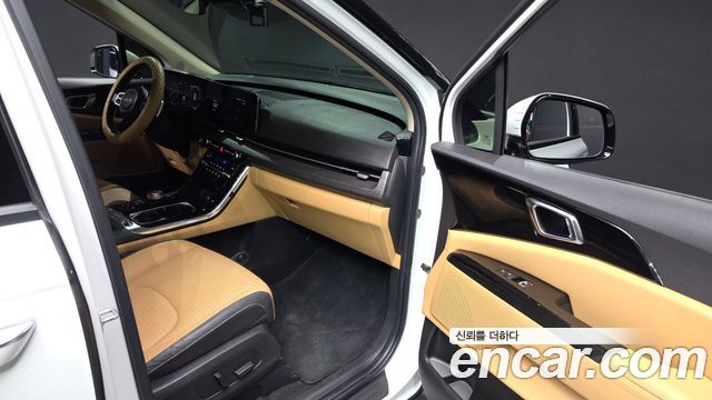 Kia Canival 2023 — photo 28