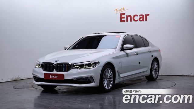BMW 5-Series 2018 — photo 1