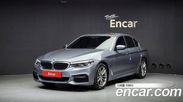 BMW 5-Series 2019 — photo 1