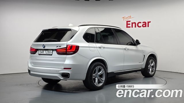 BMW X5 2018 — photo 2