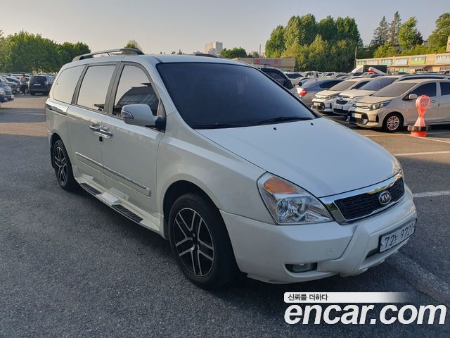 Kia Canival 2011 — photo 3