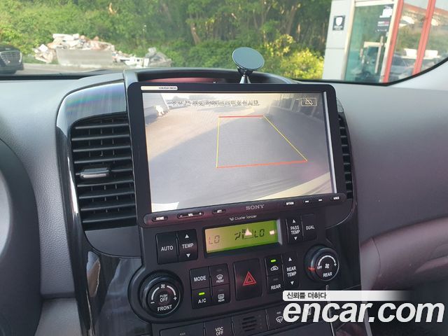 Kia Canival 2011 — photo 13
