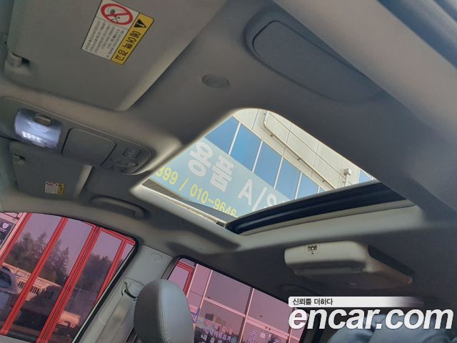Kia Canival 2011 — photo 14