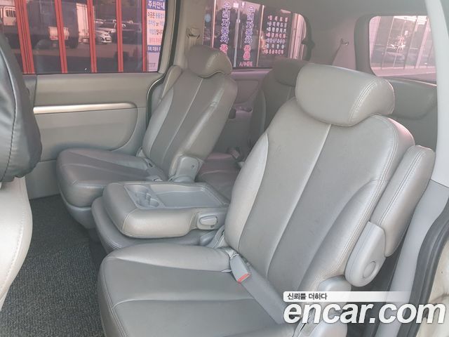 Kia Canival 2011 — photo 17