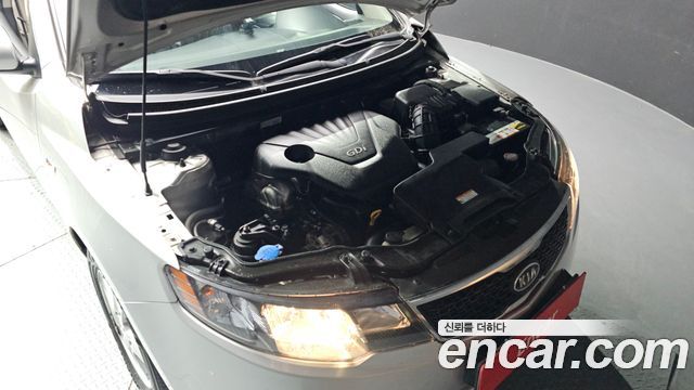 Kia Porte 2013 — photo 6