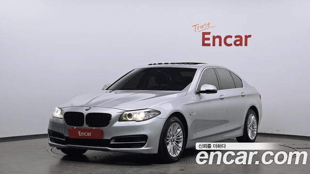 BMW 5-Series 2014 — photo 1