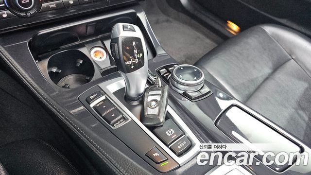 BMW 5-Series 2014 — photo 9