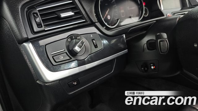 BMW 5-Series 2014 — photo 16
