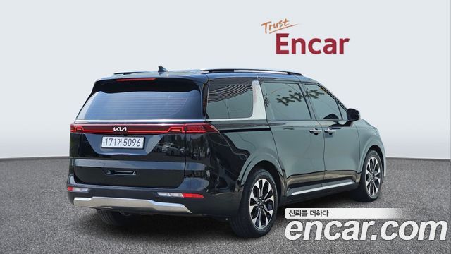Kia Canival 2023 — photo 2