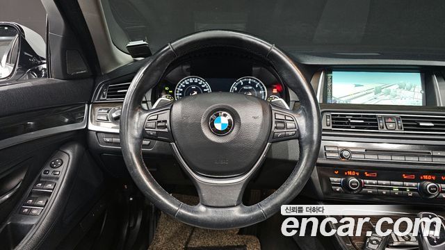 BMW 5-Series 2014 — photo 13