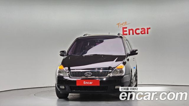 Kia Canival 2011 — photo 3