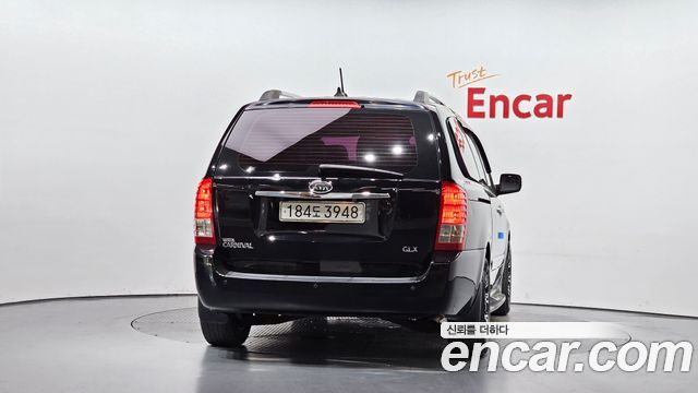 Kia Canival 2011 — photo 4