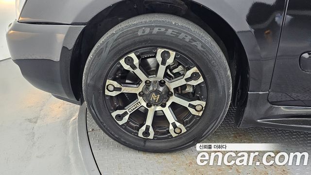 Kia Canival 2011 — photo 5