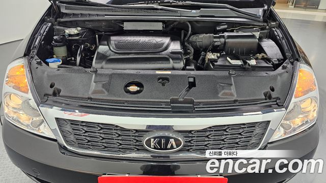 Kia Canival 2011 — photo 6